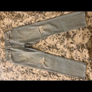 High wasted ripped faded wash Levi’s